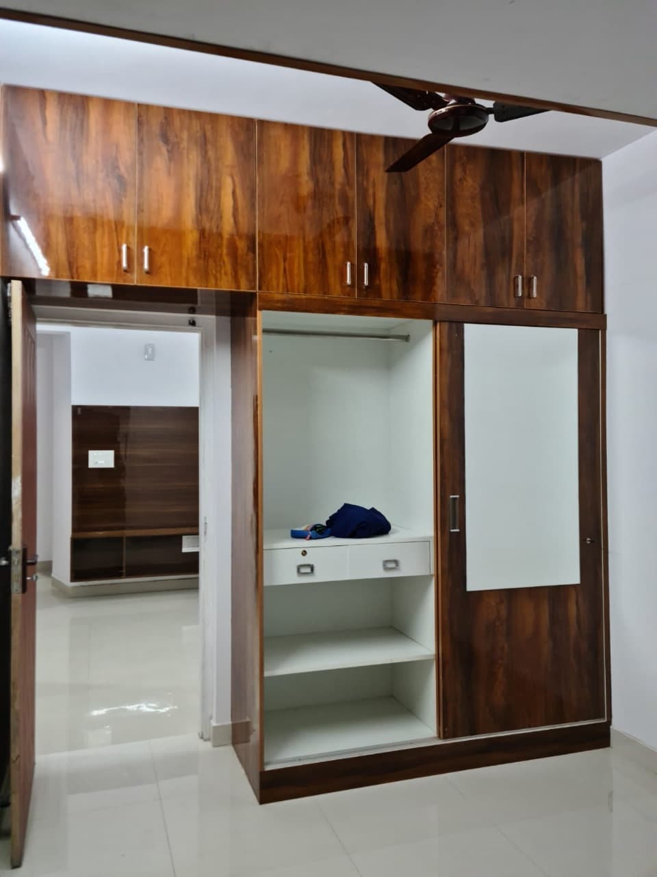 Bedroom with built-in wardrobe finish