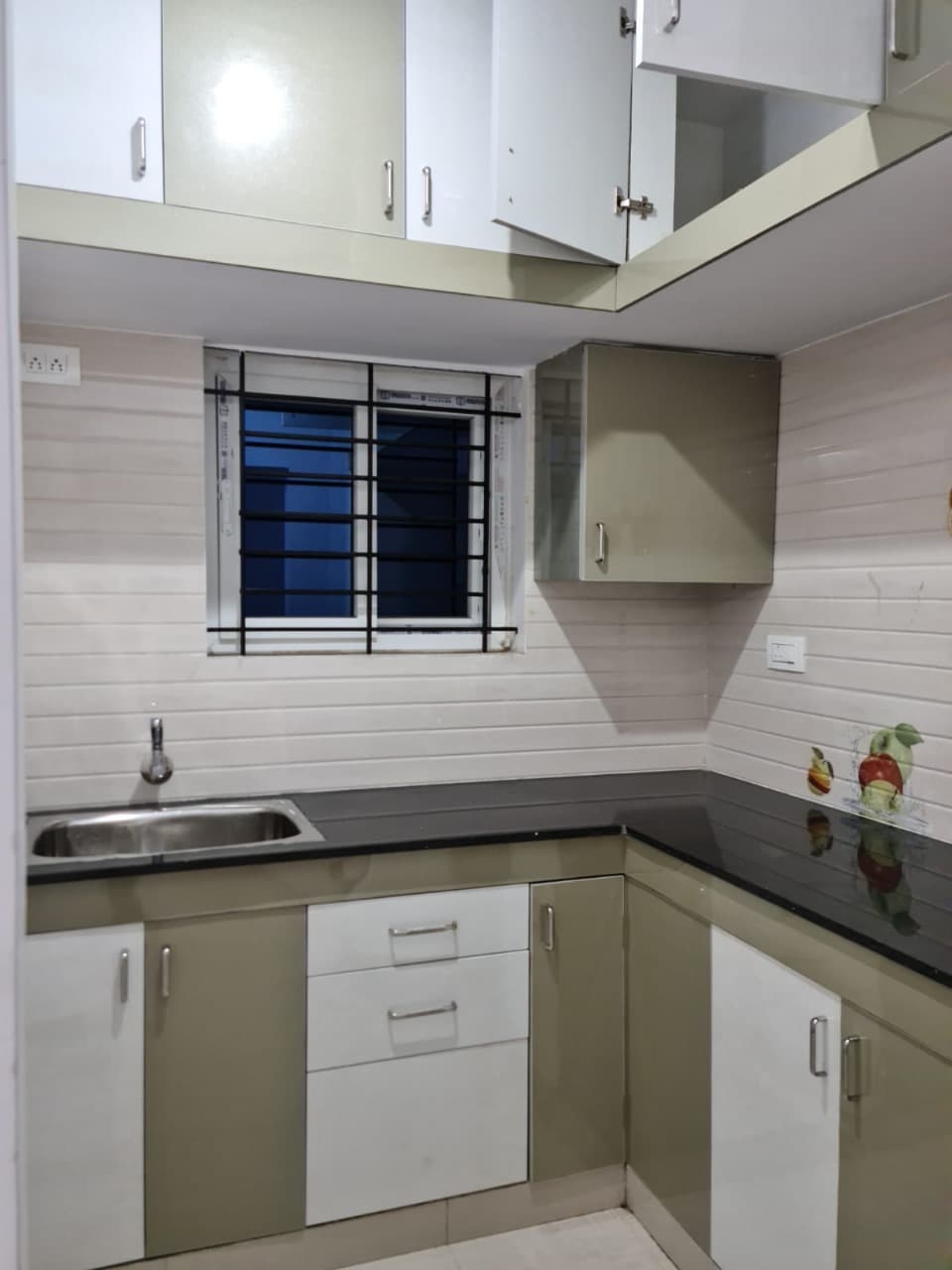 Modular kitchen with overhead cabinets
